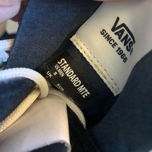 Snow boots with tags from vans
